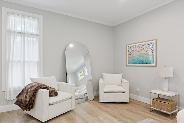 79 Oakside Rd, Smithtown, NY 11787 - sitting room featuring wood finished floors and ornamental molding