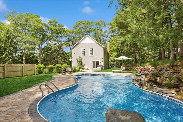 79 Oakside Rd, Smithtown, NY 11787 - view of pool featuring a patio area and view of scattered trees