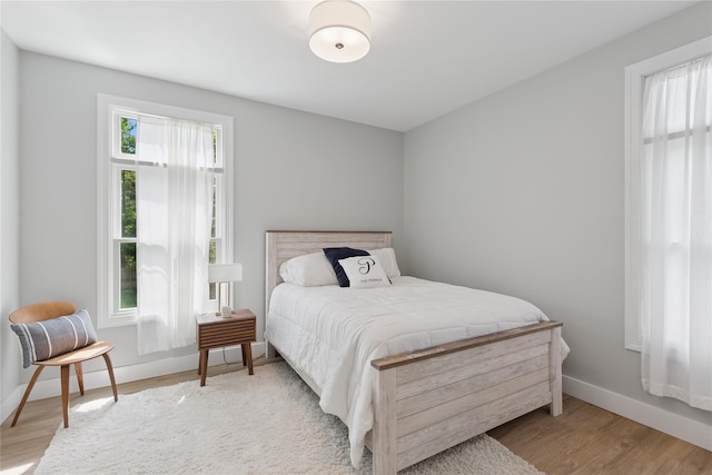 79 Oakside Rd, Smithtown, NY 11787 - bedroom featuring wood finished floors and baseboards