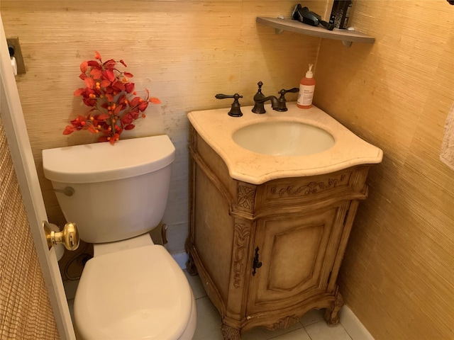26910 Grand Central Pkwy Unit 8N, Floral Park, NY 11005 - bathroom featuring vanity, toilet, and tile patterned flooring