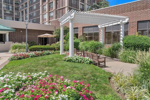 26910 Grand Central Pkwy Unit 8N, Floral Park, NY 11005 - view of home's community with a pergola and a yard