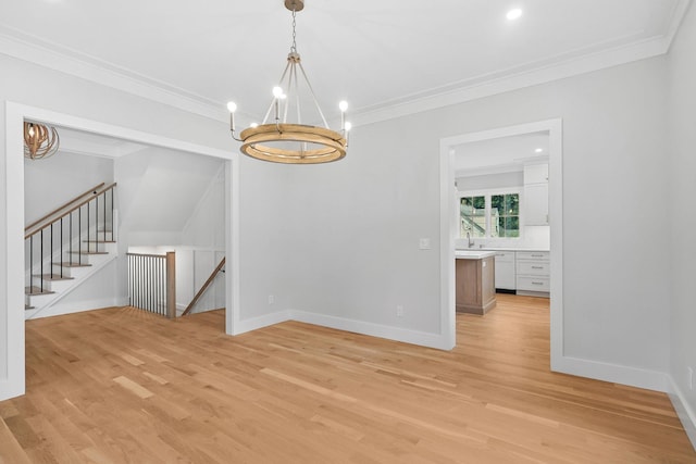 2 Lavender Ln, Rye, NY 10580 - unfurnished room with a chandelier, light wood finished floors, crown molding, and baseboards