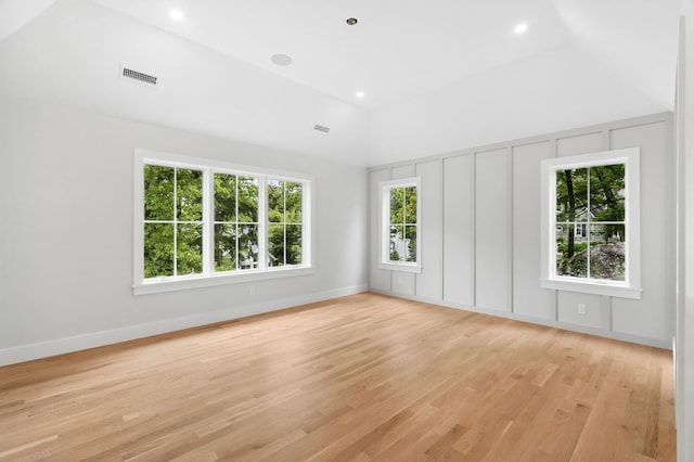 2 Lavender Ln, Rye, NY 10580 - spare room featuring light wood-style flooring, baseboards, and vaulted ceiling
