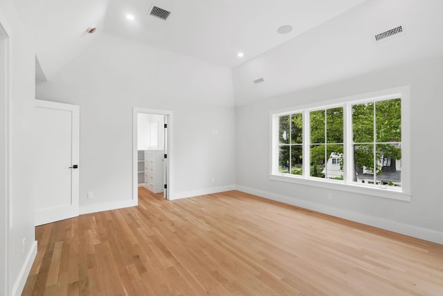 2 Lavender Ln, Rye, NY 10580 - spare room with lofted ceiling, baseboards, and light wood-style flooring