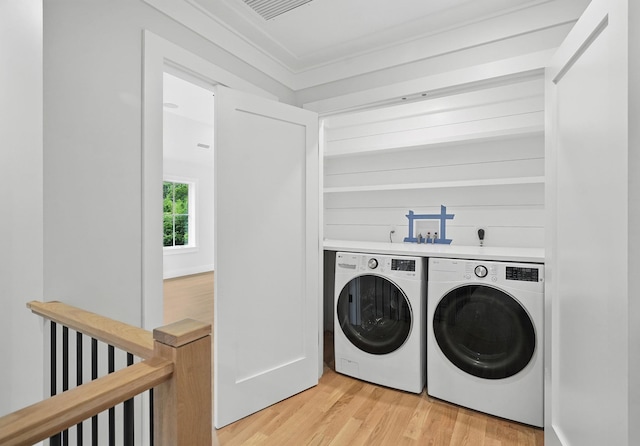 2 Lavender Ln, Rye, NY 10580 - washroom with washing machine and dryer, light wood-style flooring, and ornamental molding