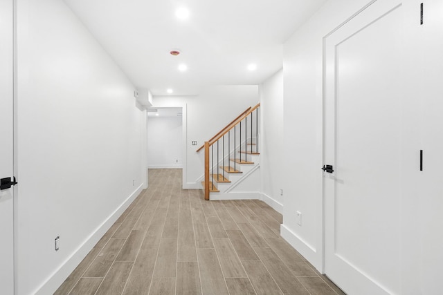 2 Lavender Ln, Rye, NY 10580 - corridor featuring light wood-type flooring, recessed lighting, stairs, and baseboards