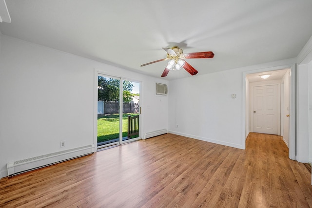 218 Beaver Dr, Mastic Beach, NY 11951 - spare room featuring baseboard heating, a wall mounted air conditioner, light wood finished floors, and a ceiling fan