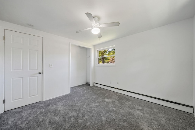 218 Beaver Dr, Mastic Beach, NY 11951 - unfurnished bedroom with baseboard heating, carpet floors, a closet, ceiling fan, and baseboards