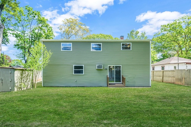 218 Beaver Dr, Mastic Beach, NY 11951 - back of house with a chimney