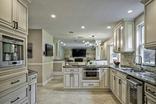 2 Maize Ct, Melville, NY 11747 - kitchen with a sink, cream cabinetry, beverage cooler, a peninsula, and recessed lighting