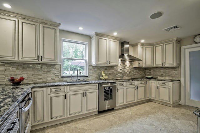 2 Maize Ct, Melville, NY 11747 - kitchen featuring wall chimney exhaust hood, cream cabinetry, dishwasher, and recessed lighting
