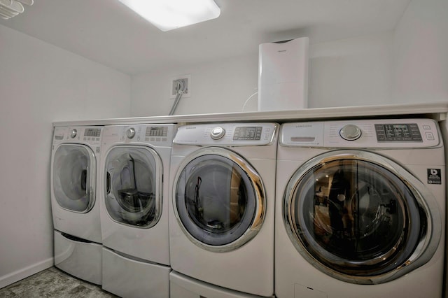 2 Maize Ct, Melville, NY 11747 - laundry area featuring separate washer and dryer and baseboards