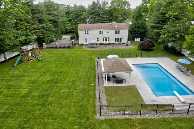 2 Maize Ct, Melville, NY 11747 - view of pool with a patio, a diving board, and a playground