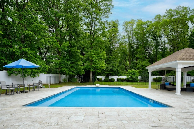 2 Maize Ct, Melville, NY 11747 - view of pool with a gazebo, a patio area, an outdoor hangout area, and view of wooded area