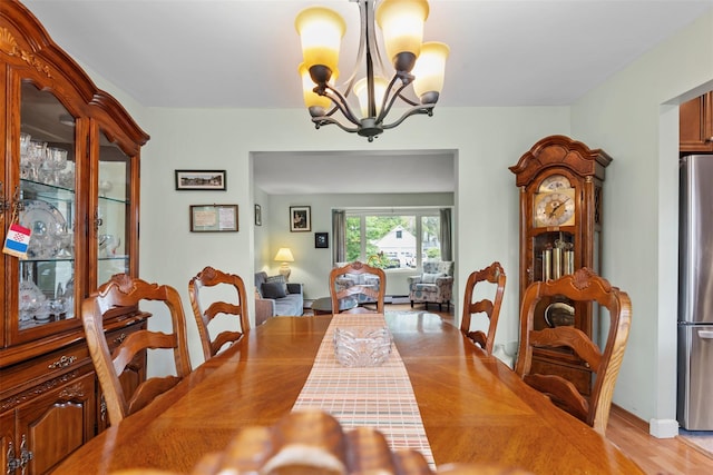 1A Ward St, Suffern, NY 10901 - dining room featuring a chandelier and light wood finished floors