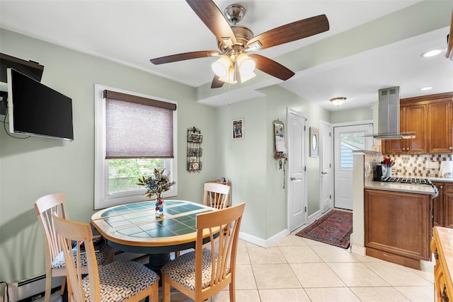 1A Ward St, Suffern, NY 10901 - dining space featuring ceiling fan, baseboards, light tile patterned floors, and recessed lighting