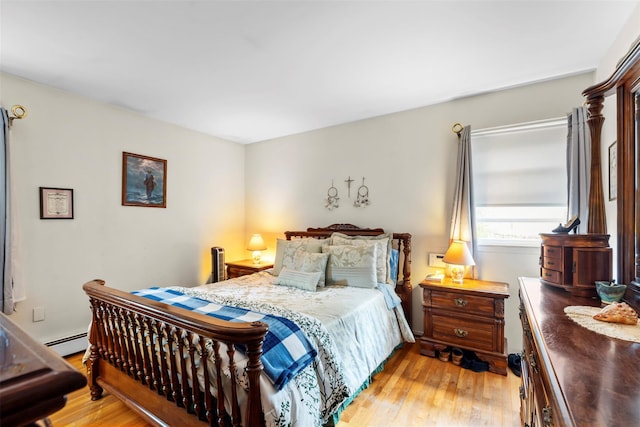 1A Ward St, Suffern, NY 10901 - bedroom with light wood-style floors and baseboard heating