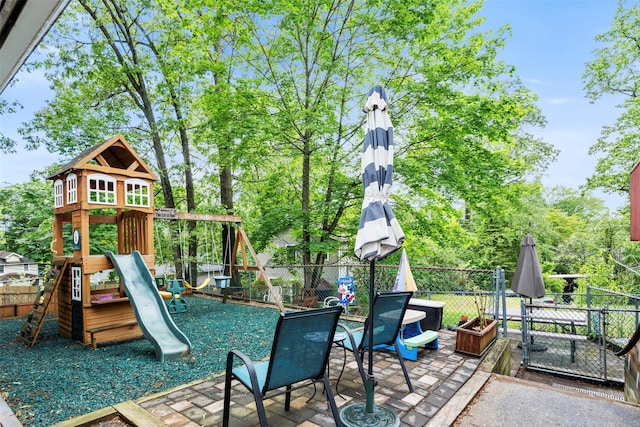 1A Ward St, Suffern, NY 10901 - view of jungle gym featuring a fenced backyard and view of scattered trees