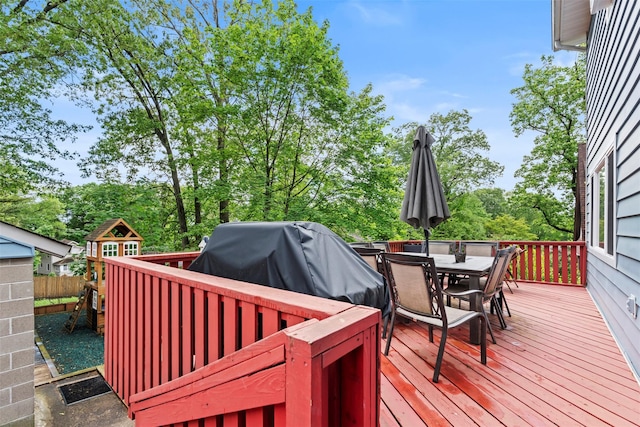 1A Ward St, Suffern, NY 10901 - wooden terrace with outdoor dining area, a playground, and area for grilling