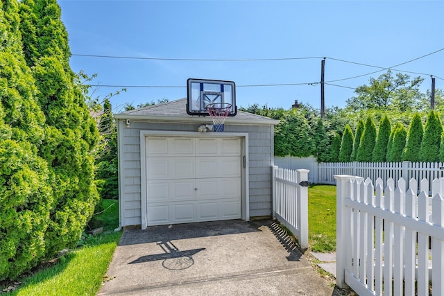 11 Spruce St, Garden City, NY 11530 - detached garage featuring concrete driveway
