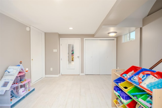 11 Spruce St, Garden City, NY 11530 - game room featuring light wood finished floors and recessed lighting