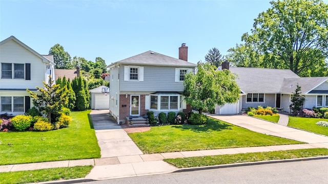 11 Spruce St, Garden City, NY 11530 - view of front of home featuring a chimney, concrete driveway, an outdoor structure, brick siding, and a front yard