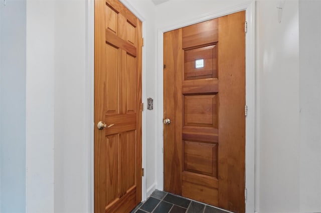 55 Stephanie Ln, Poughkeepsie, NY 12603 - doorway featuring dark tile patterned floors