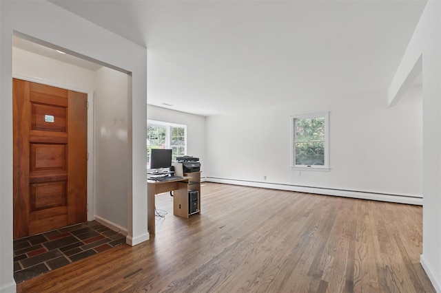 55 Stephanie Ln, Poughkeepsie, NY 12603 - office space featuring baseboard heating, wood finished floors, and baseboards