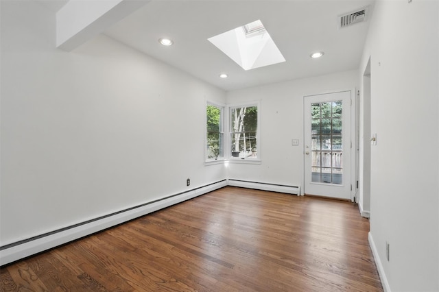 55 Stephanie Ln, Poughkeepsie, NY 12603 - unfurnished room featuring a skylight, a baseboard heating unit, wood finished floors, recessed lighting, and baseboards