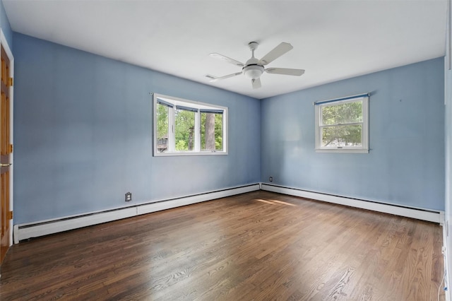 55 Stephanie Ln, Poughkeepsie, NY 12603 - unfurnished room featuring wood finished floors, plenty of natural light, a ceiling fan, and a baseboard radiator