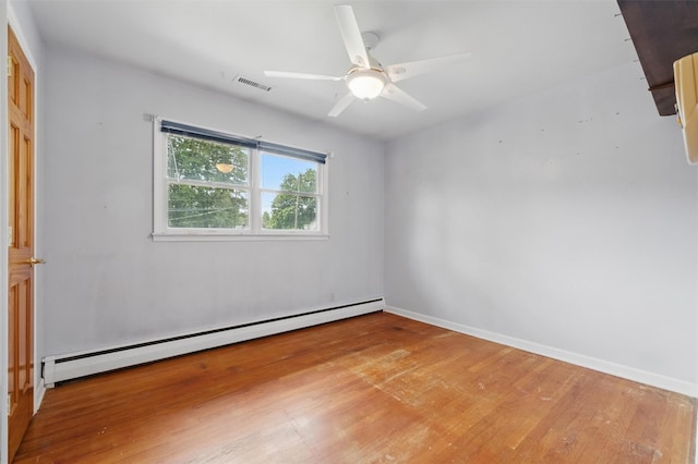 55 Stephanie Ln, Poughkeepsie, NY 12603 - spare room featuring a baseboard radiator, wood finished floors, ceiling fan, and baseboards