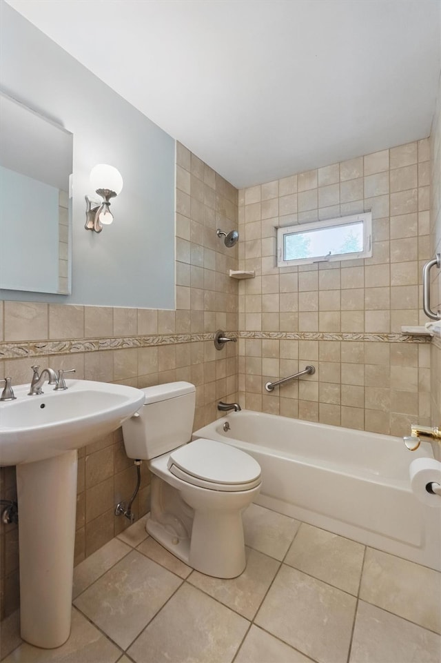 55 Stephanie Ln, Poughkeepsie, NY 12603 - full bathroom with tile walls, toilet, shower / bath combination, tile patterned floors, and a sink