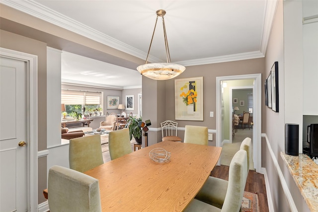 50 Popham Rd Unit 4E, Scarsdale, NY 10583 - dining space with wood finished floors, crown molding, and baseboards