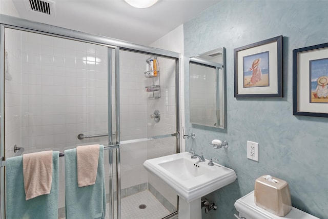 50 Popham Rd Unit 4E, Scarsdale, NY 10583 - full bathroom featuring toilet, a stall shower, and a sink