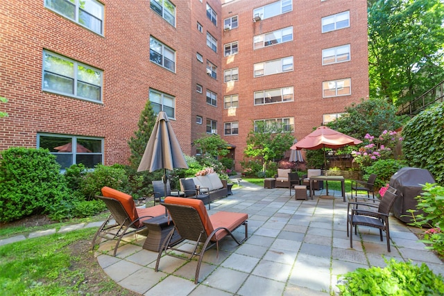 50 Popham Rd Unit 4E, Scarsdale, NY 10583 - view of patio with an outdoor living space and area for grilling