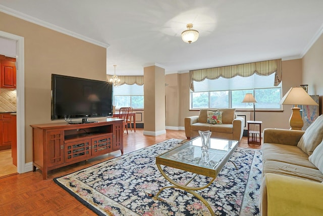 1270 N Ave Unit 3A, New Rochelle, NY 10804 - living area featuring ornamental molding, a chandelier, and baseboards