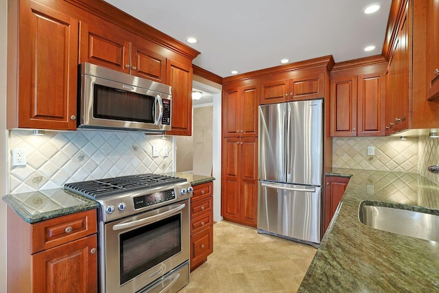 1270 N Ave Unit 3A, New Rochelle, NY 10804 - kitchen with stainless steel appliances, dark stone countertops, a sink, tasteful backsplash, and recessed lighting