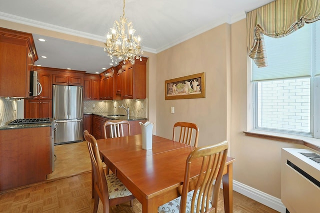 1270 N Ave Unit 3A, New Rochelle, NY 10804 - dining area with a chandelier, crown molding, recessed lighting, and baseboards