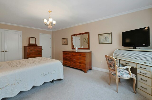 1270 N Ave Unit 3A, New Rochelle, NY 10804 - bedroom featuring a chandelier, ornamental molding, light colored carpet, and baseboards