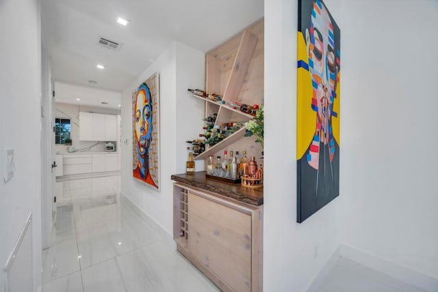 50 Gristmill Ln, Great Neck, NY 11023 - hall featuring baseboards, recessed lighting, and tile patterned flooring