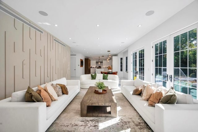50 Gristmill Ln, Great Neck, NY 11023 - living room with recessed lighting and french doors