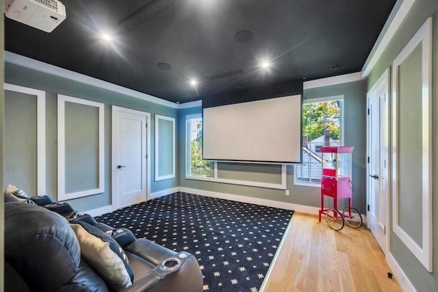 50 Gristmill Ln, Great Neck, NY 11023 - cinema room featuring wood finished floors and crown molding