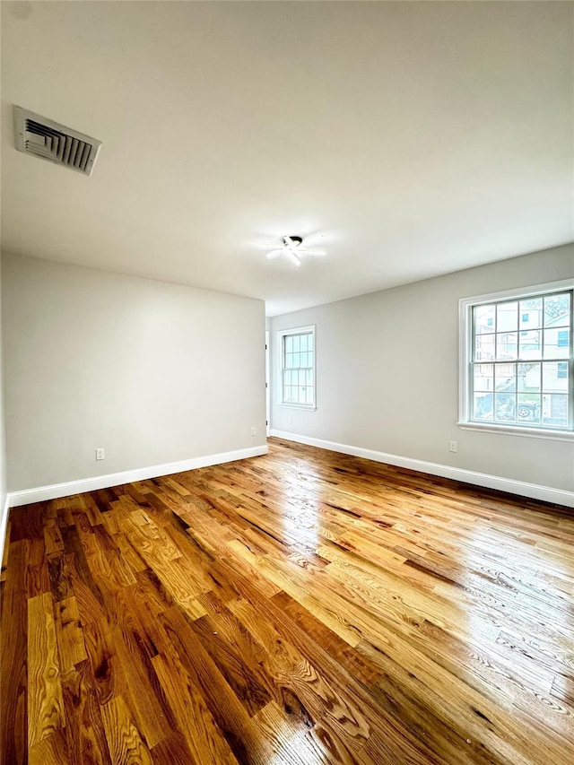 56 Patmore Ave, Yonkers, NY 10710 - empty room featuring baseboards and wood finished floors
