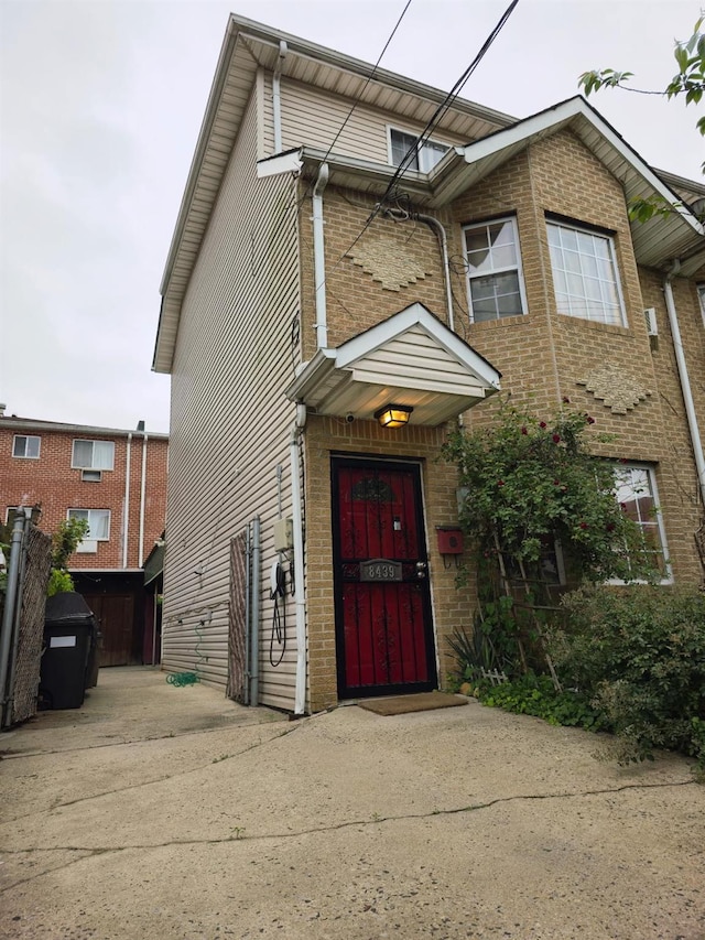 8439 130th St, Kew Gardens, NY 11415 - view of front of home with brick siding