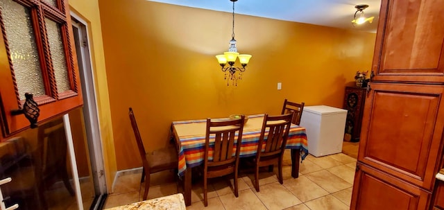 8439 130th St, Kew Gardens, NY 11415 - dining room with a chandelier and light tile patterned flooring