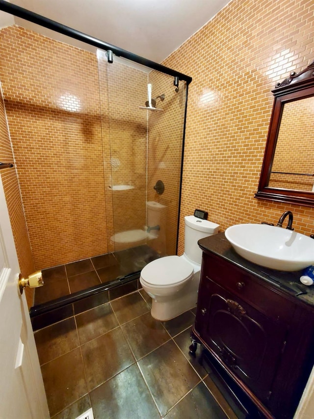 8439 130th St, Kew Gardens, NY 11415 - full bath featuring toilet, tiled shower, vanity, tile walls, and tile patterned flooring