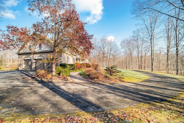75 Susan Ln, Circleville, NY 10919 - view of front of home featuring a garage and asphalt driveway