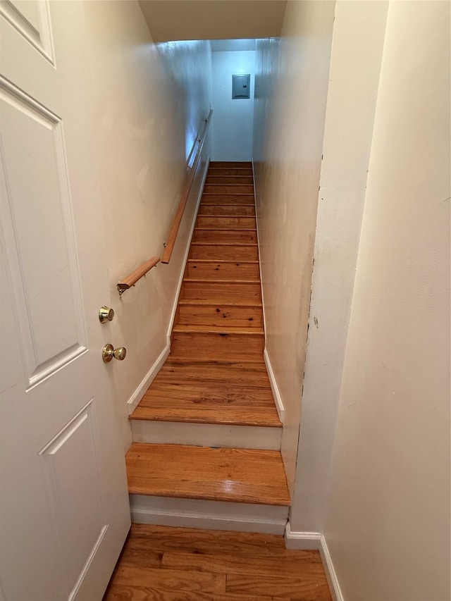 10808 86th St, Ozone Park, NY 11417 - stairs featuring wood finished floors and baseboards
