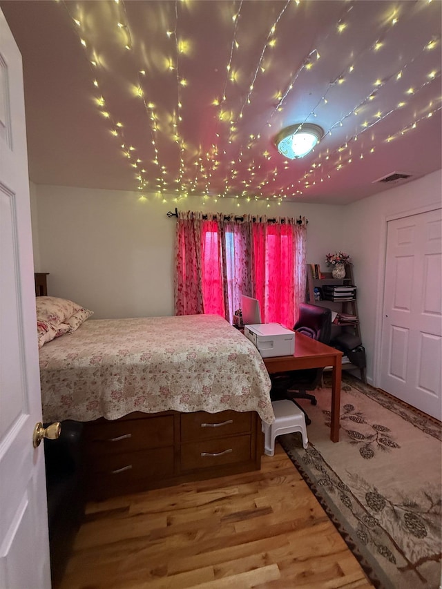 10808 86th St, Ozone Park, NY 11417 - bedroom with wood finished floors