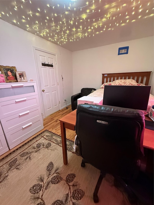 10808 86th St, Ozone Park, NY 11417 - bedroom featuring wood finished floors